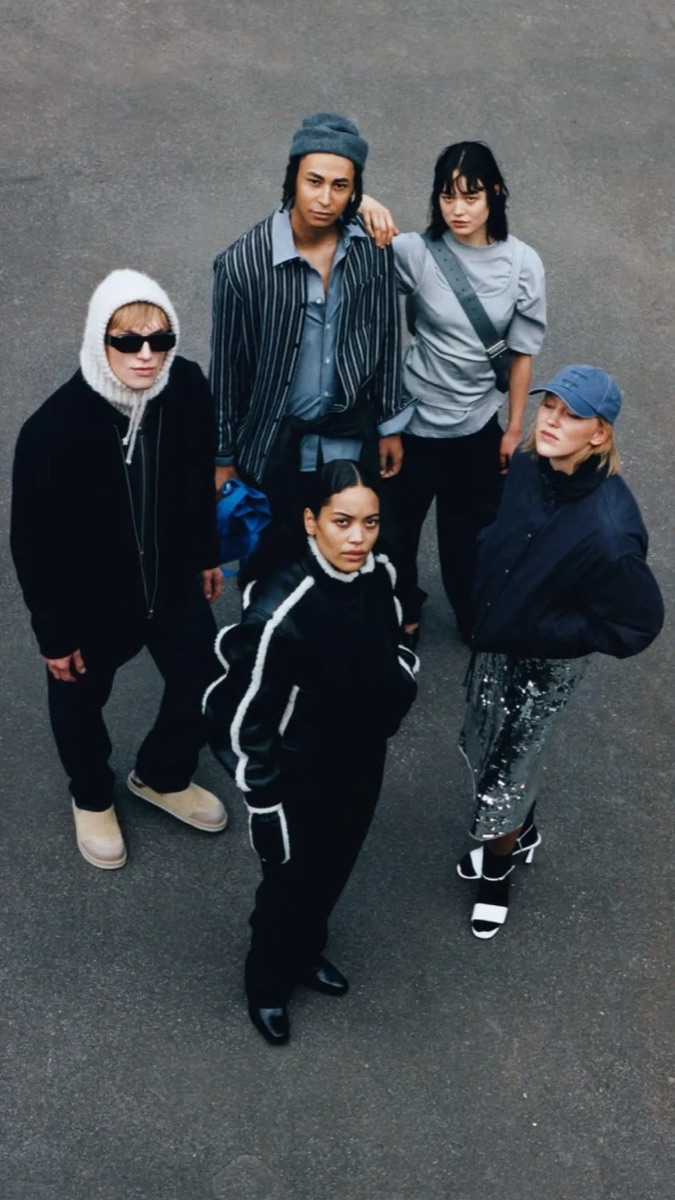 A group in dark evening looks